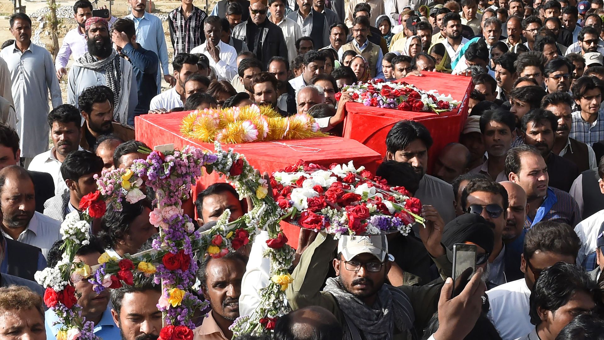 Southwest Pakistani Christians carrying a casket