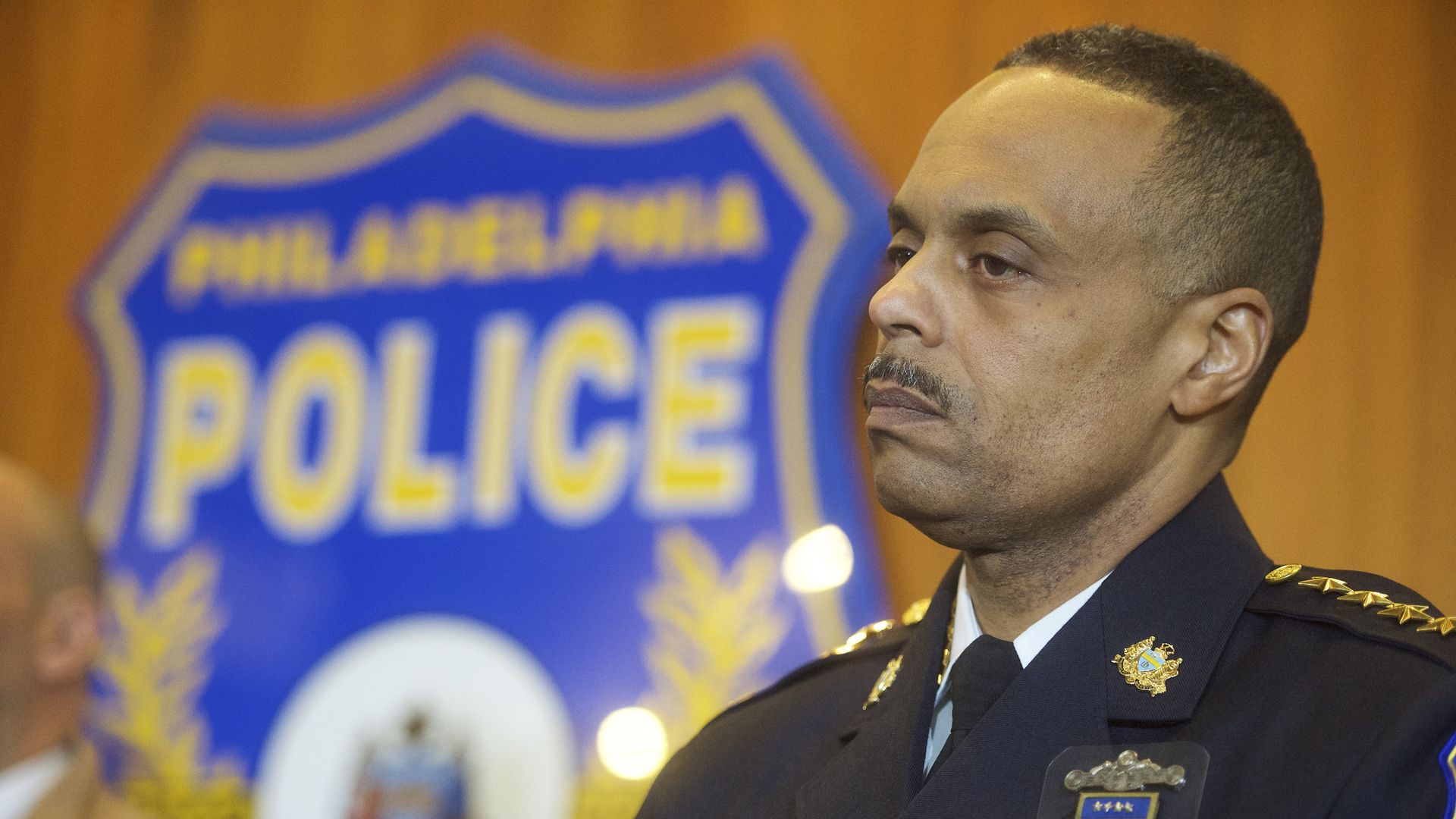 Philadelphia Police Commissioner Richard Ross listens to Mayor Jim Kenney address media at a press conference in Philadelphia, Pennsylvania.