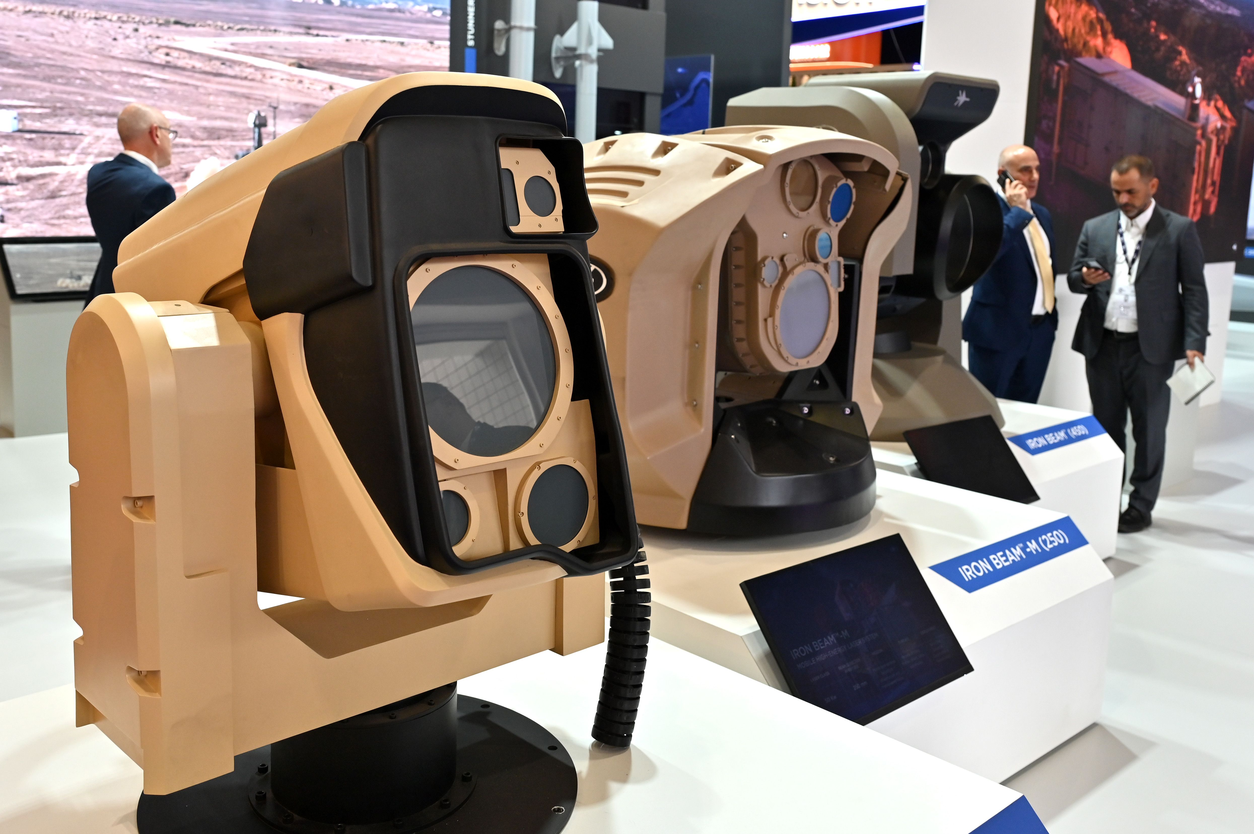 Three ground-based high-energy laser weapon systems on display at DSEI London: Lite Beam, Iron Beam-M and Iron Beam 450.