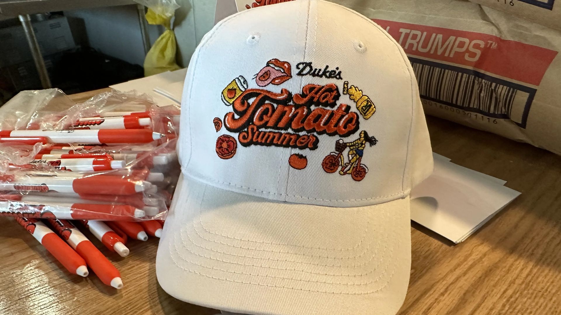 A baseball cap that says Hot Tomato summer 