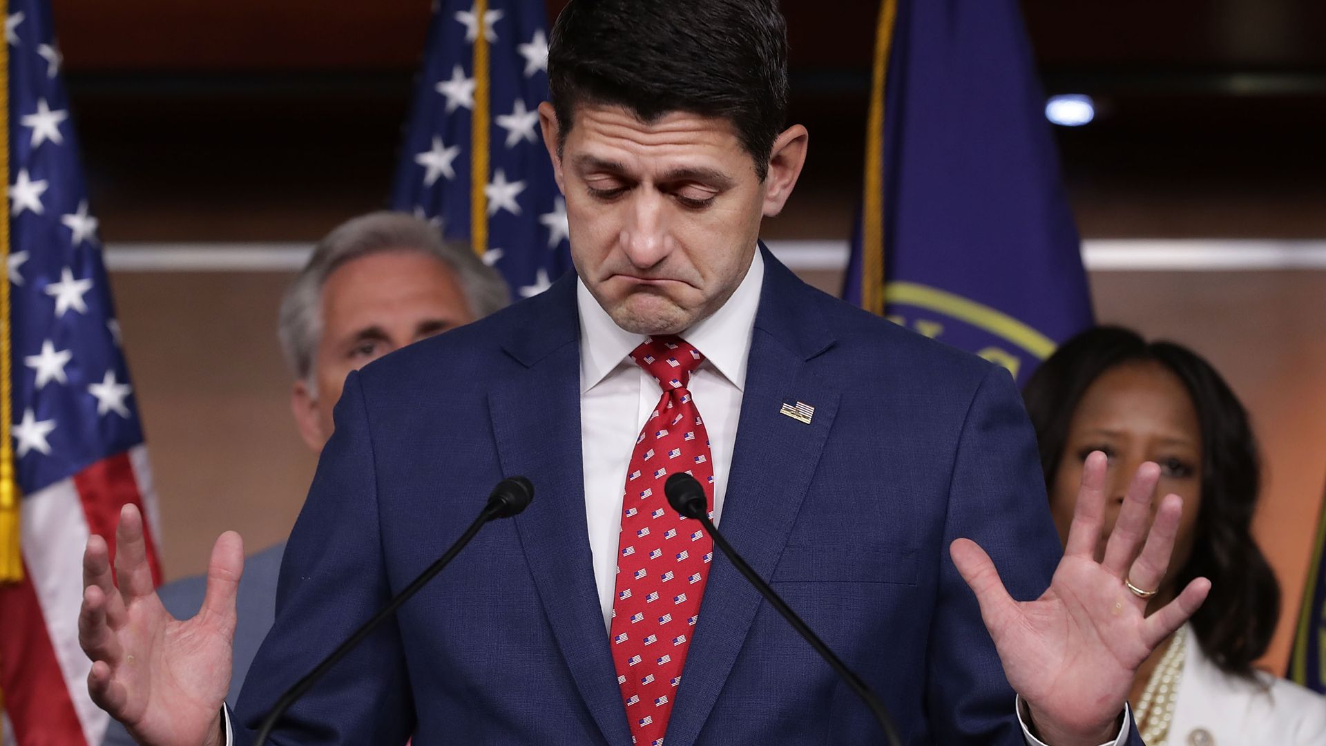 Paul Ryan with his hands up.