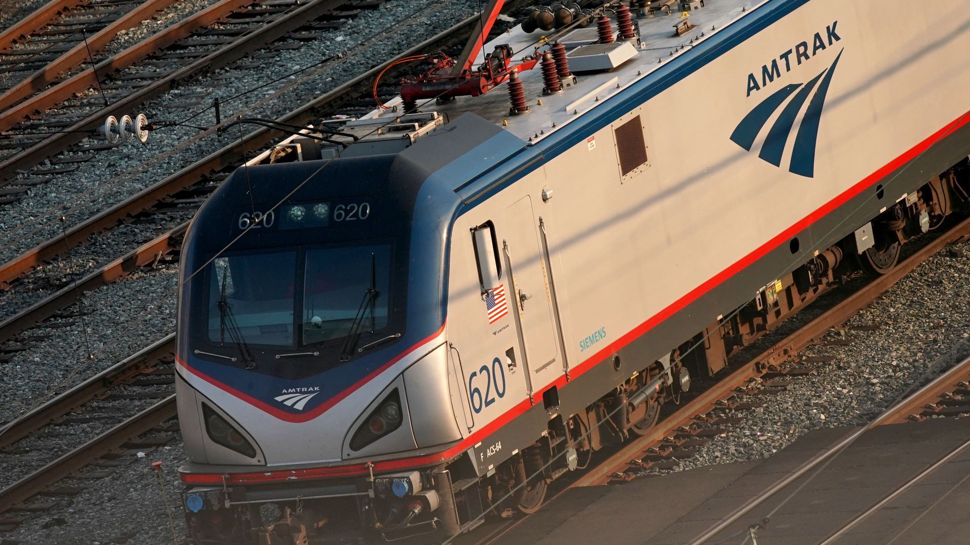Amtrak trains travel through Washington, DC, on Sept. 15.