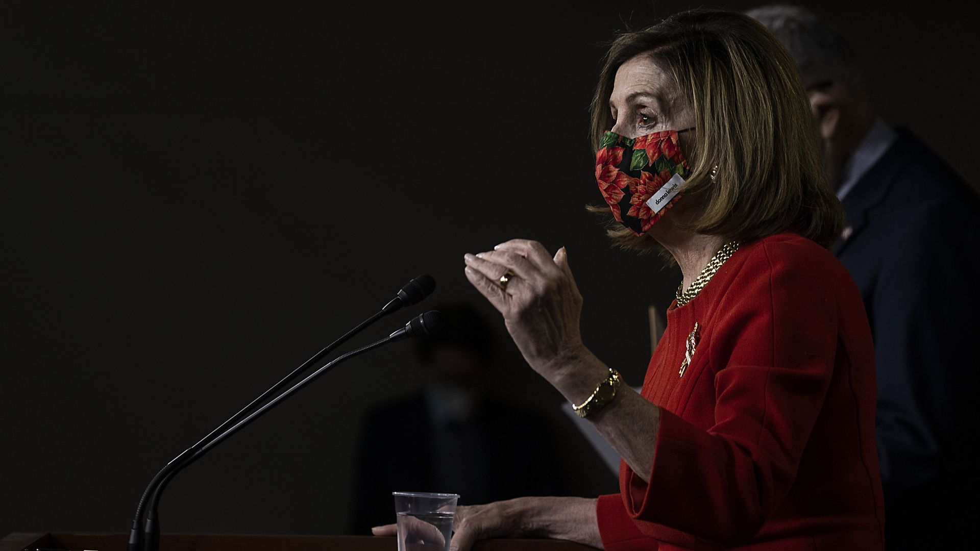House Speaker Nancy Pelosi speaks at the podium during a news conference on December 20.