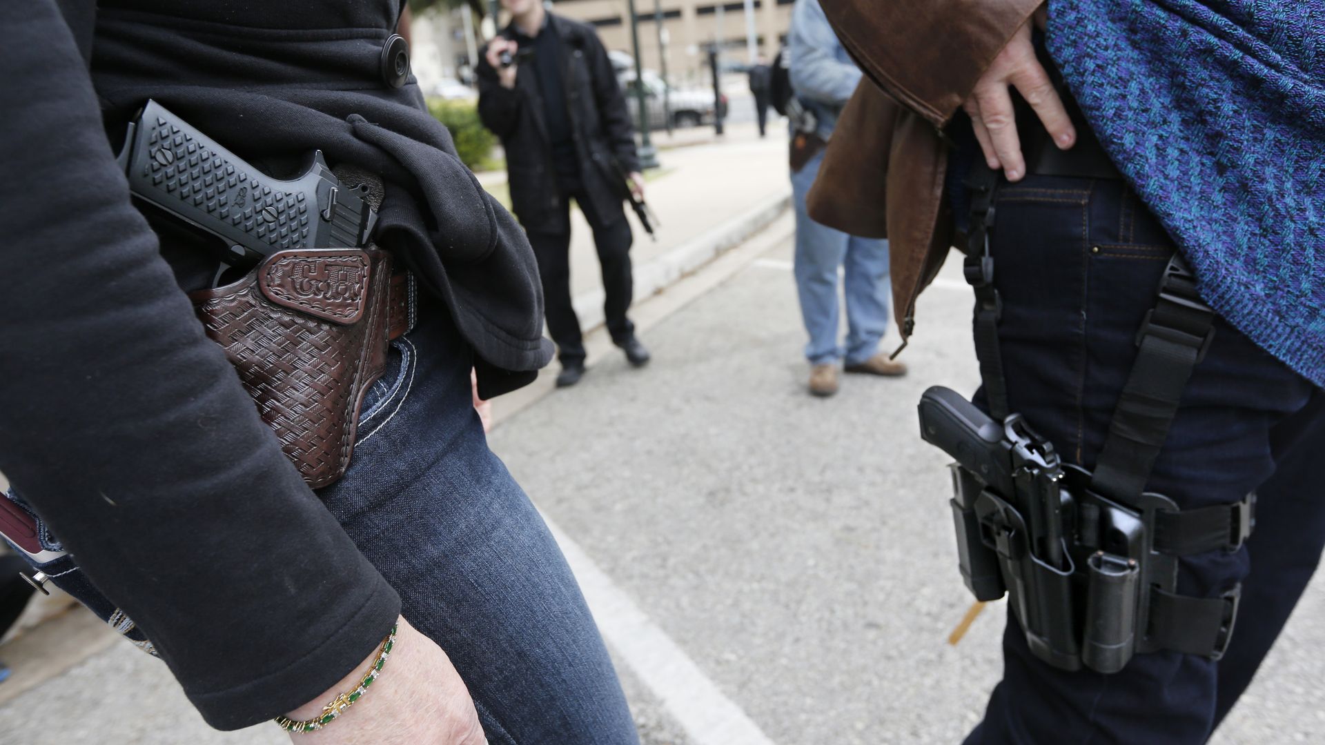 Handgun holsters during an open carry rally in Austin, Texas in 2016