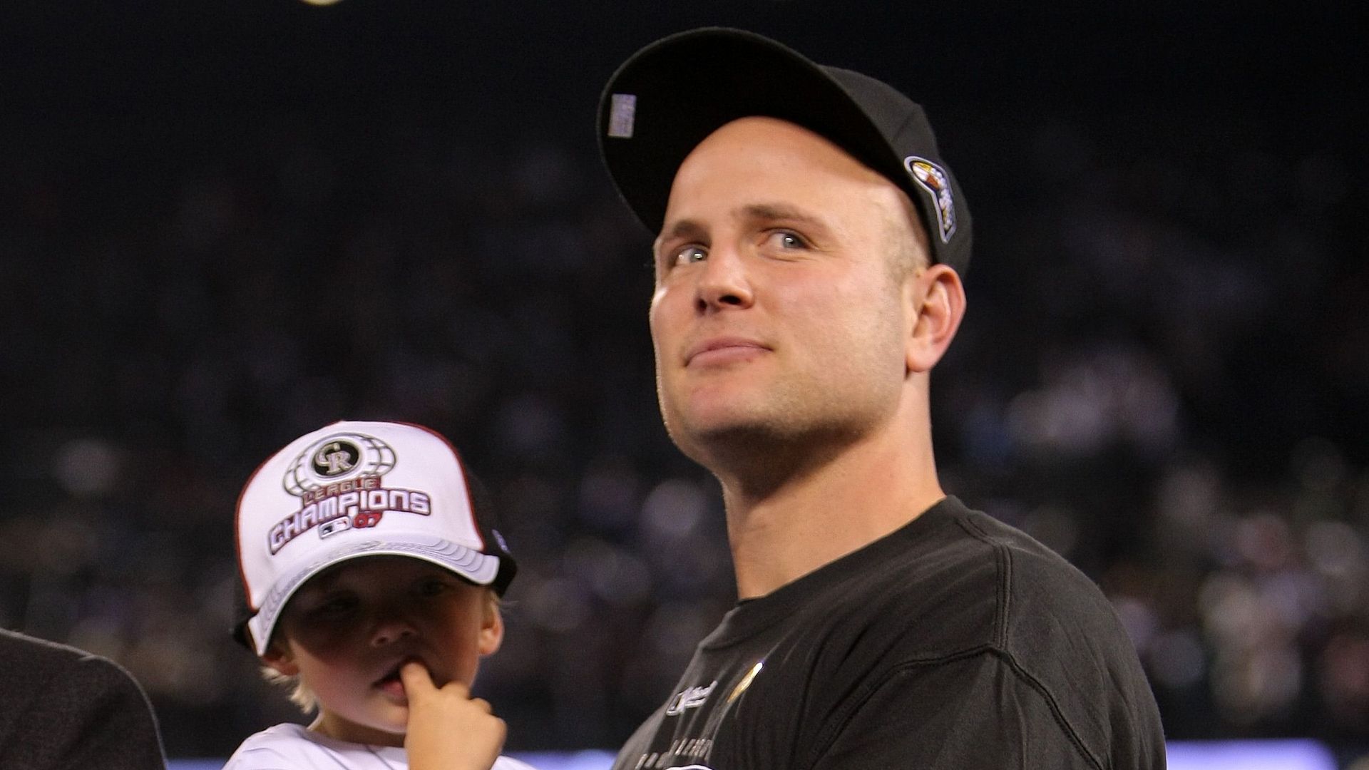 Matt and Jackson Holliday during the 2007 NLCS trophy presentation. 