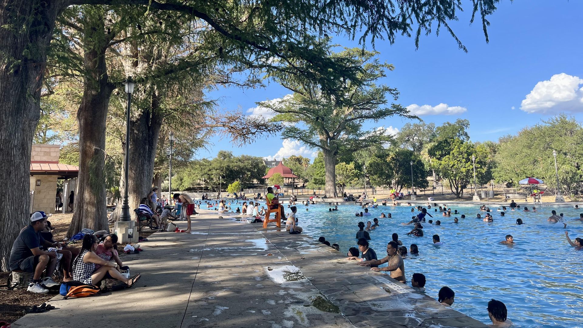 San Pedro Springs Pool is full of people during the summer.