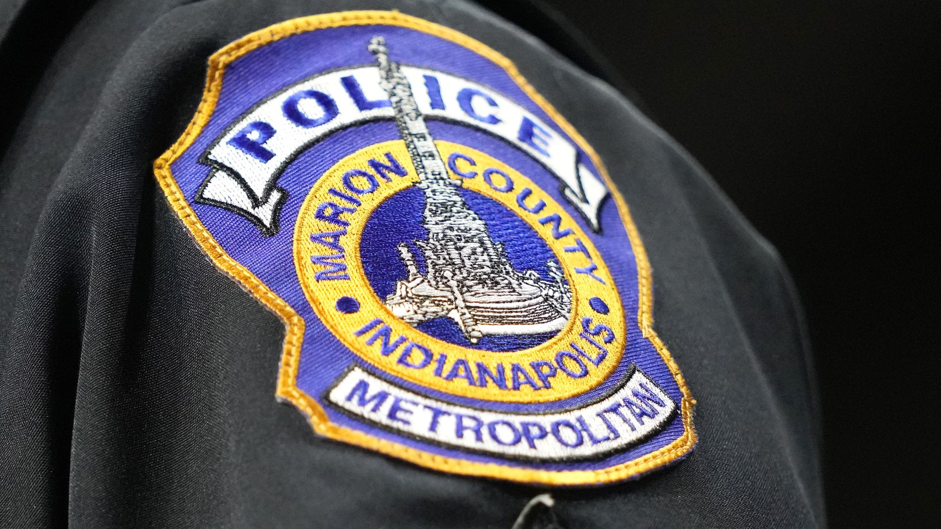 The Indianapolis police logo on a uniform during a college basketball game between the Connecticut Huskies and the Butler Bulldogs at Hinkle Fieldhouse on December 17, 2022 in Indianapolis, Indiana.
