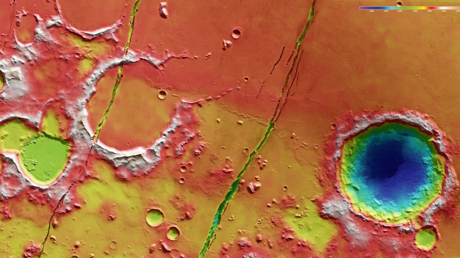 Color-coded topographic view of an area of Mars called Cerberus Fossae: reds and whites are relatively higher than blues and purples.