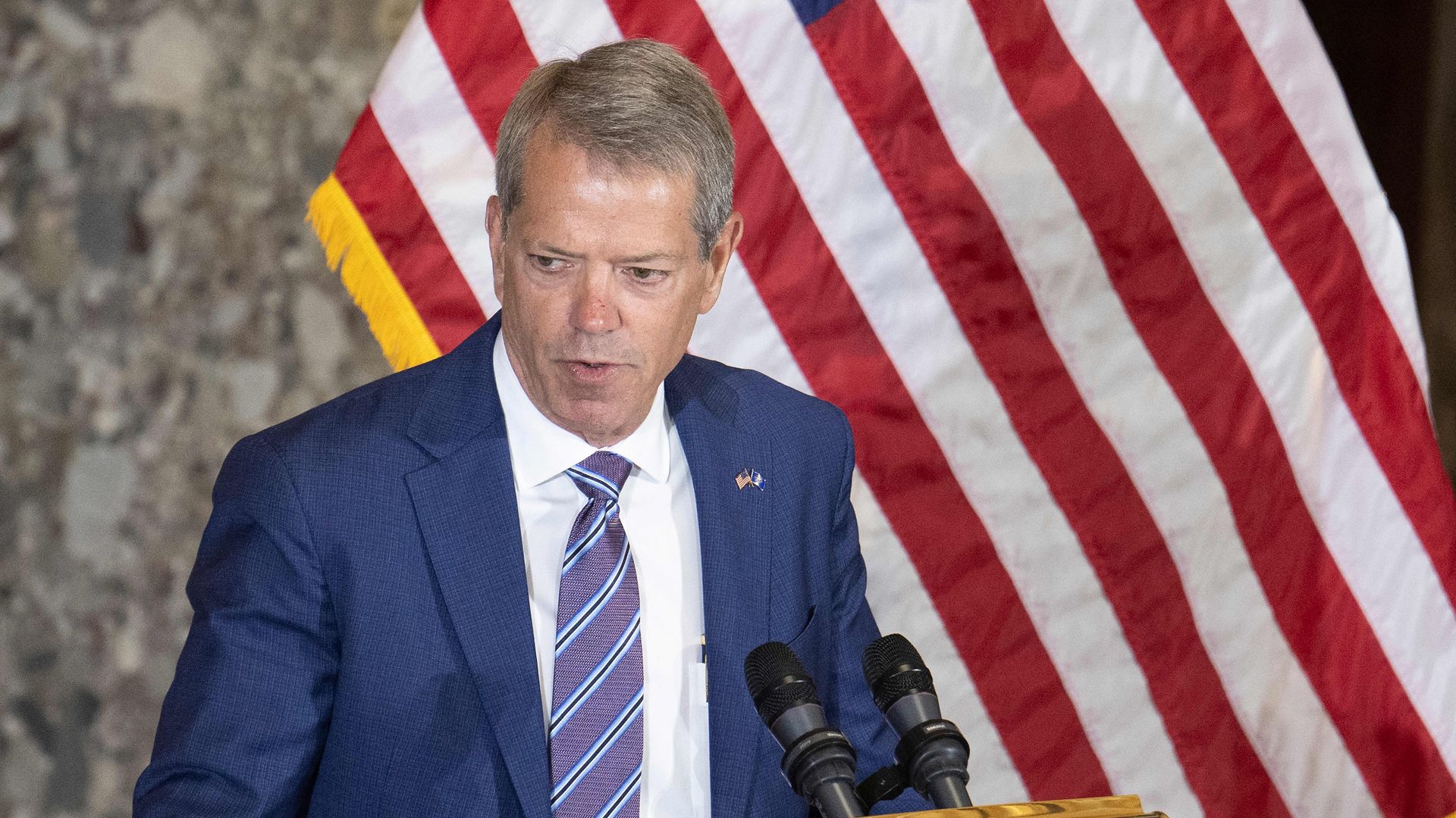 Nebraska Governor Jim Pillen speaks during a statue dedication ceremony.