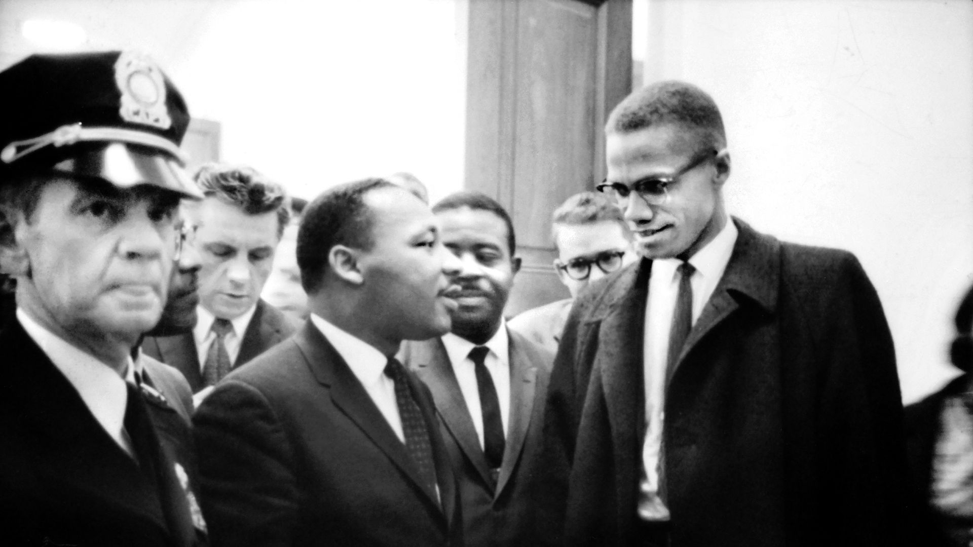 Martin Luther King and Malcolm X after a press conference at thje U.S. Capitol about Senate debate on the Civil Rights Act of 1964.