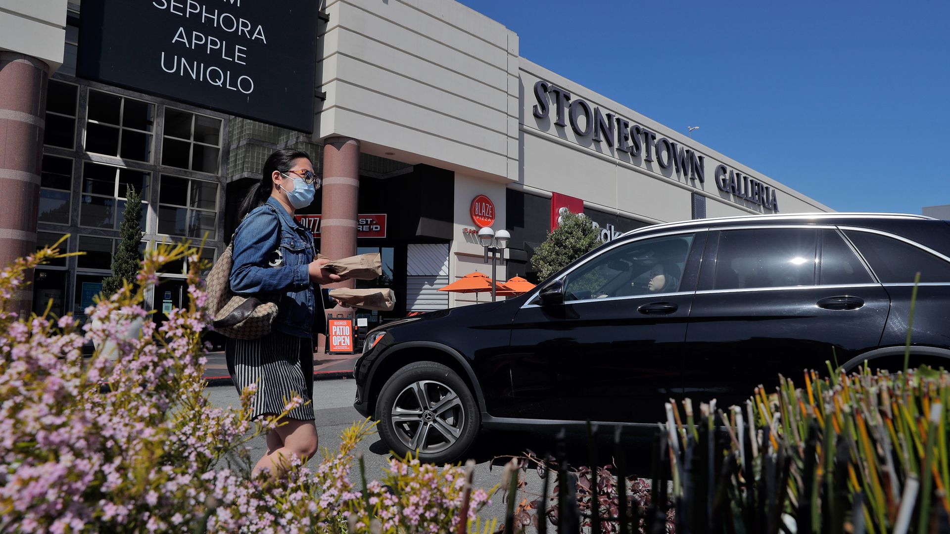 Photo of a car parked outside the Stonestown Galleria shopping mall