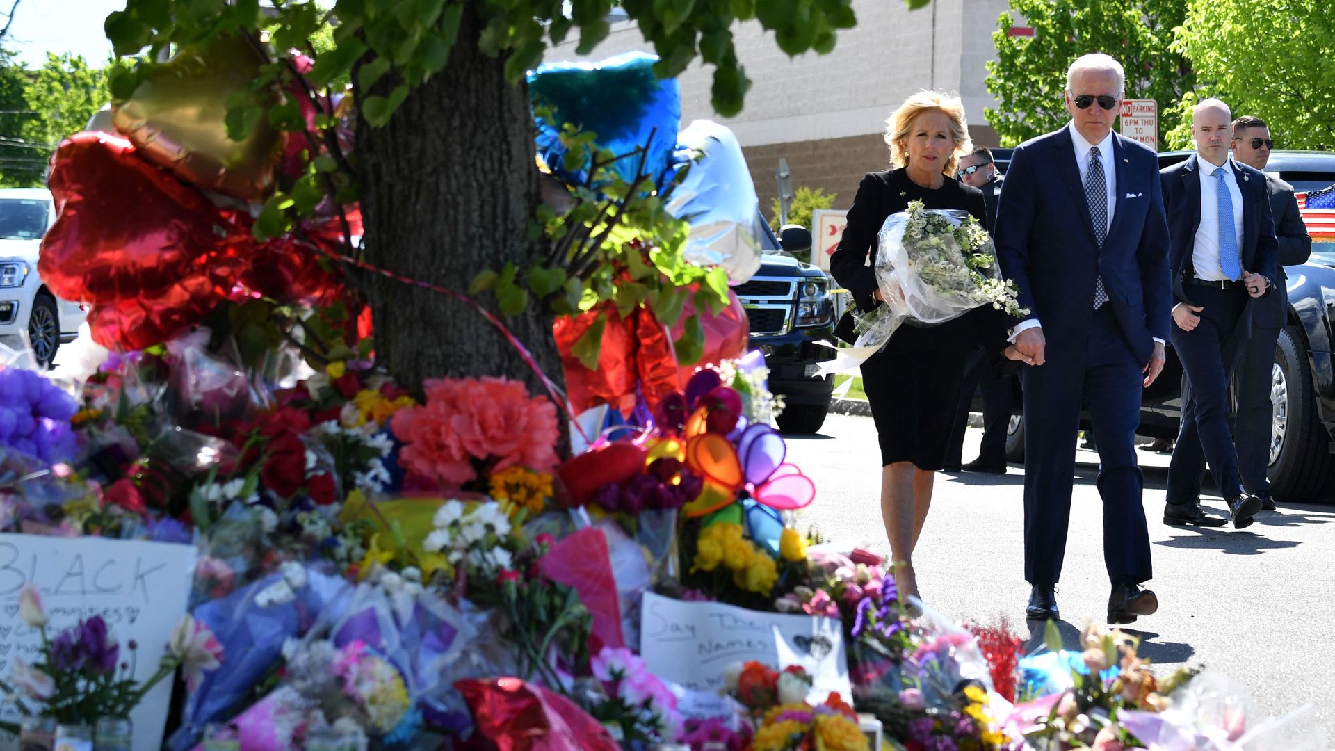 President Joe Biden and US First Lady Jill Biden arrive to a memorial near a Tops grocery store in Buffalo, New York, on May 17, 2022.