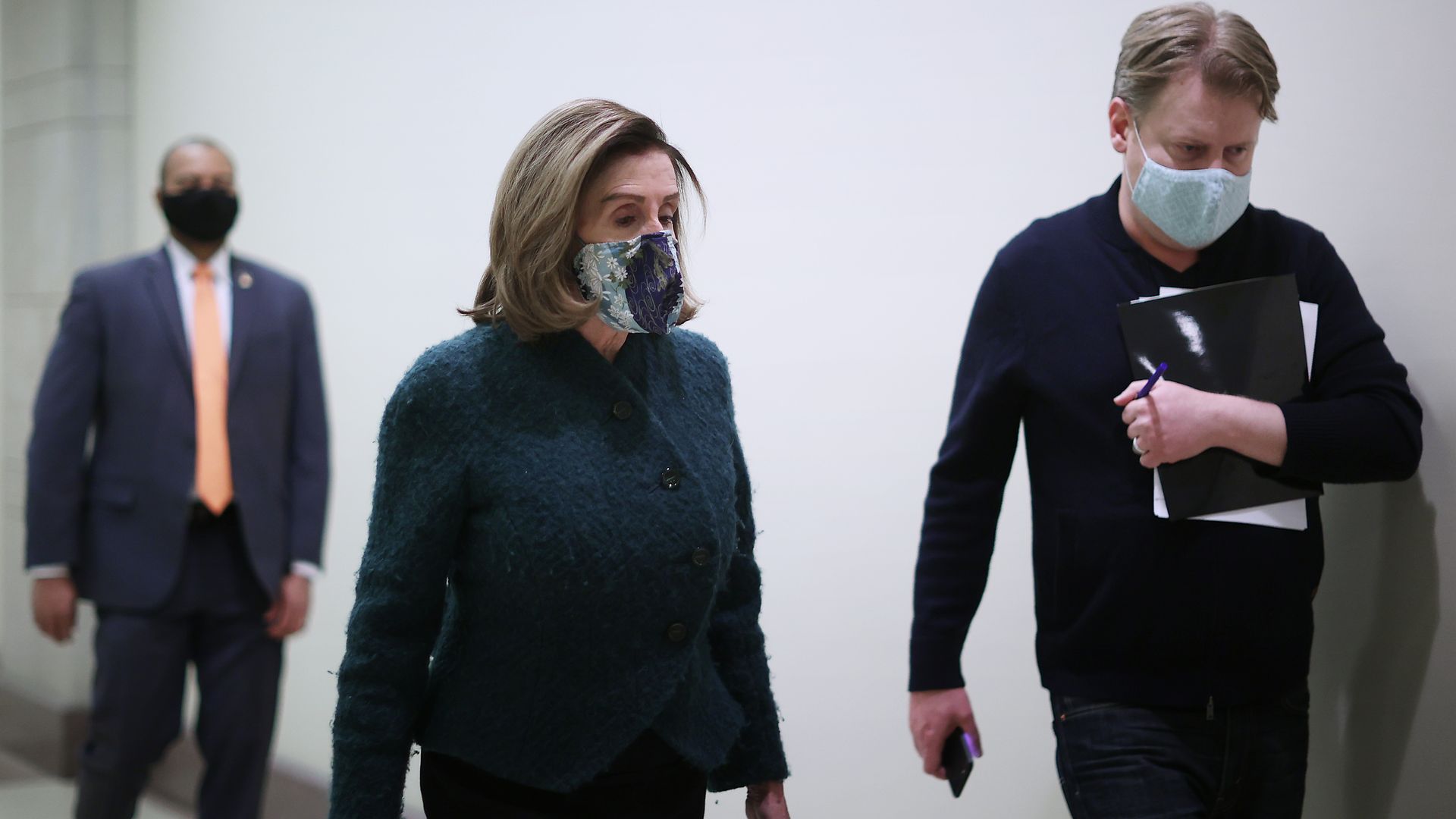 Pelosi waling through Congress in January.