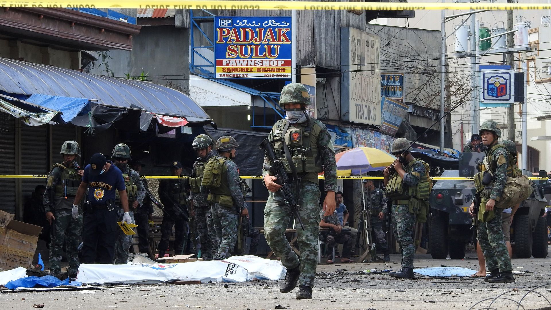 Military cleans up after bombs detonated in Philippines