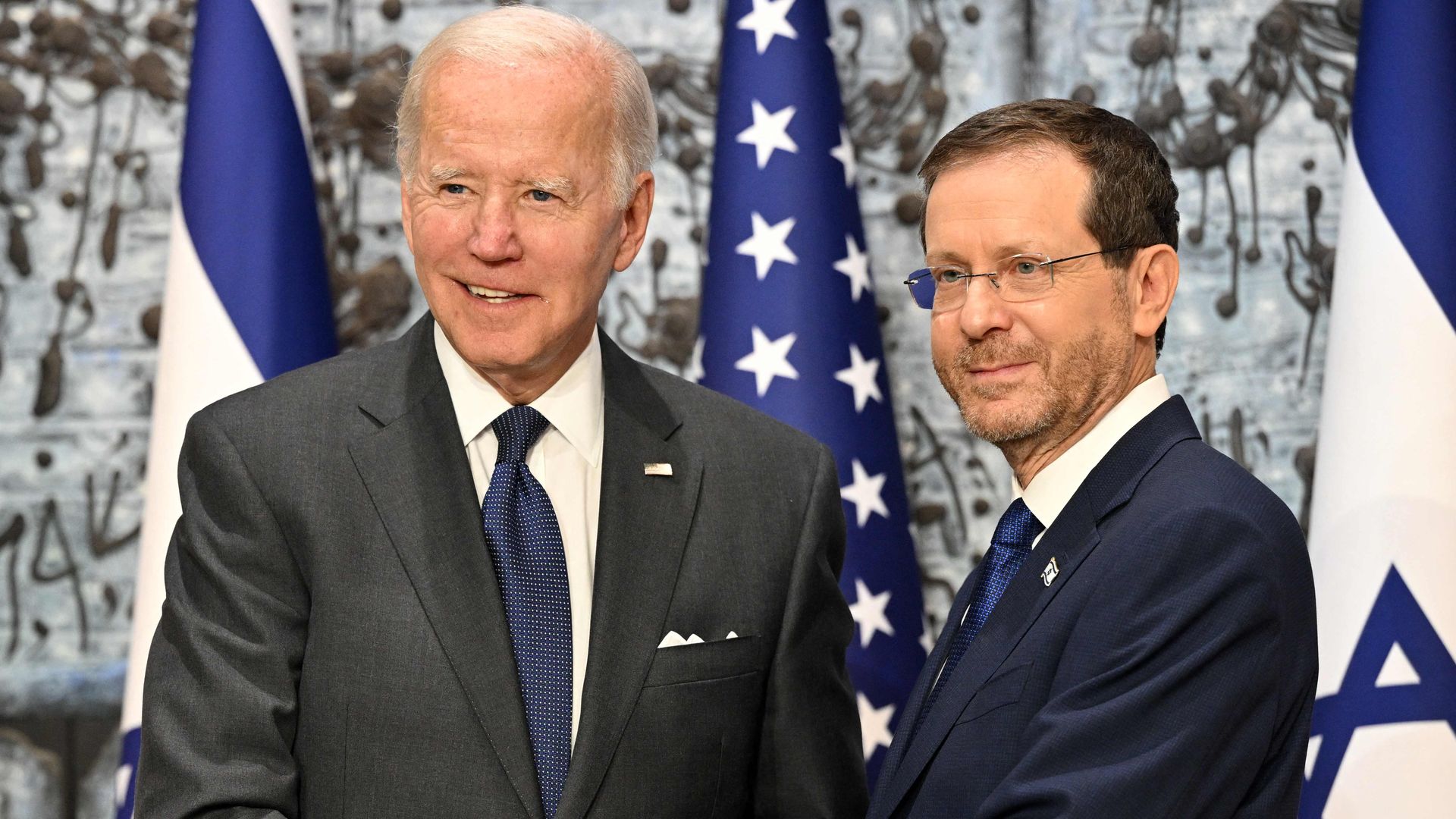 President Biden and Israeli President Isaac Herzog shake hands in Jerusalem on July 14. Photo: Mandel Ngan/AFP via Getty Images