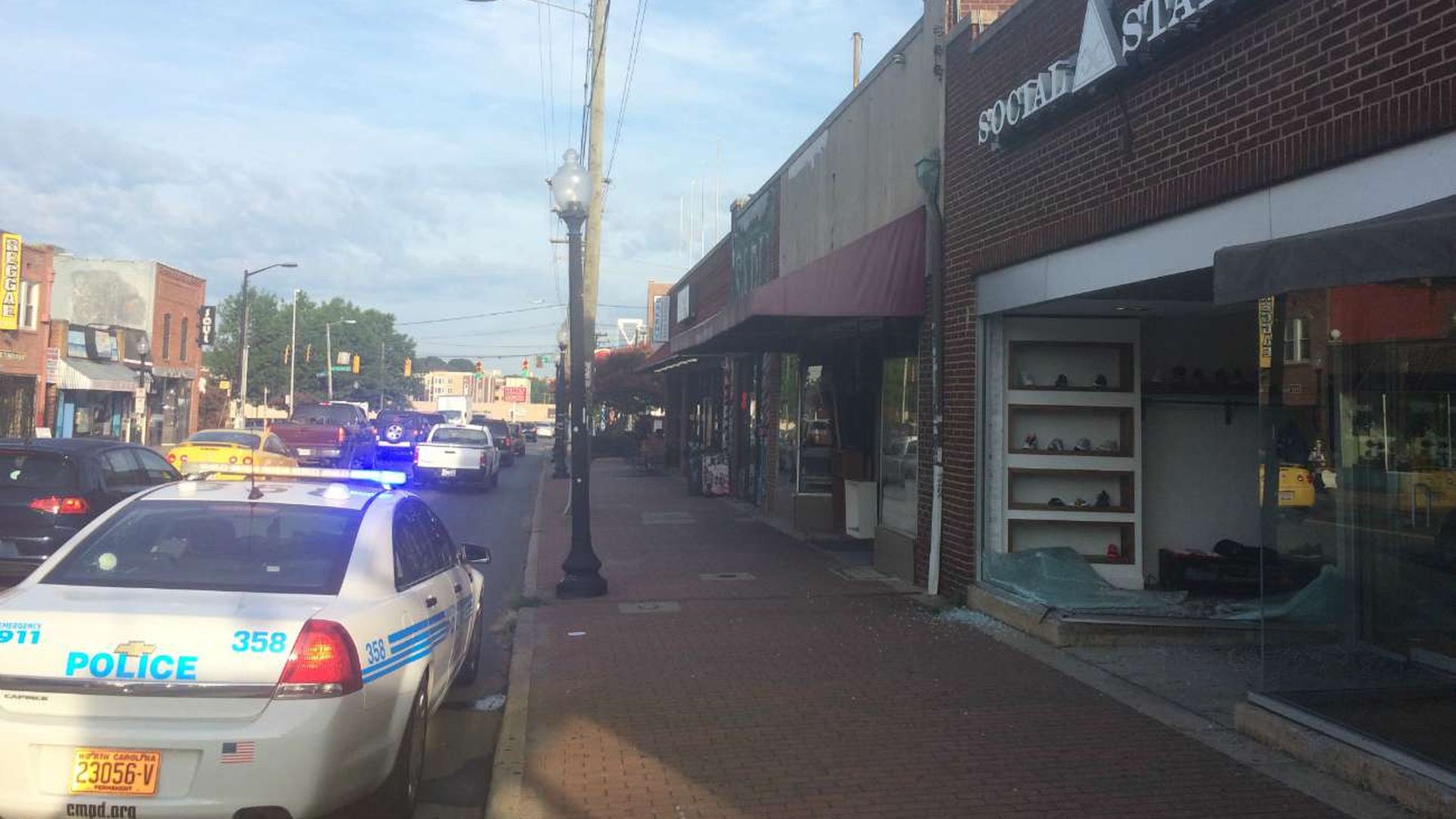 Masked thieves crashed a minivan into Social Status and stole an