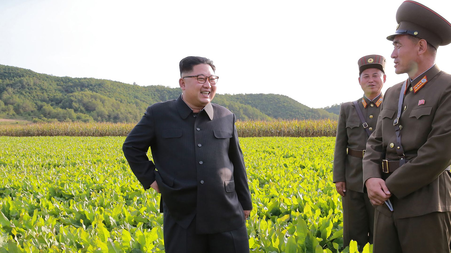 North Korean leader Kim Jong-Un (L) visiting Farm No. 1116 under Korean People's Army (KPA) Unit 810 at an undisclosed location.