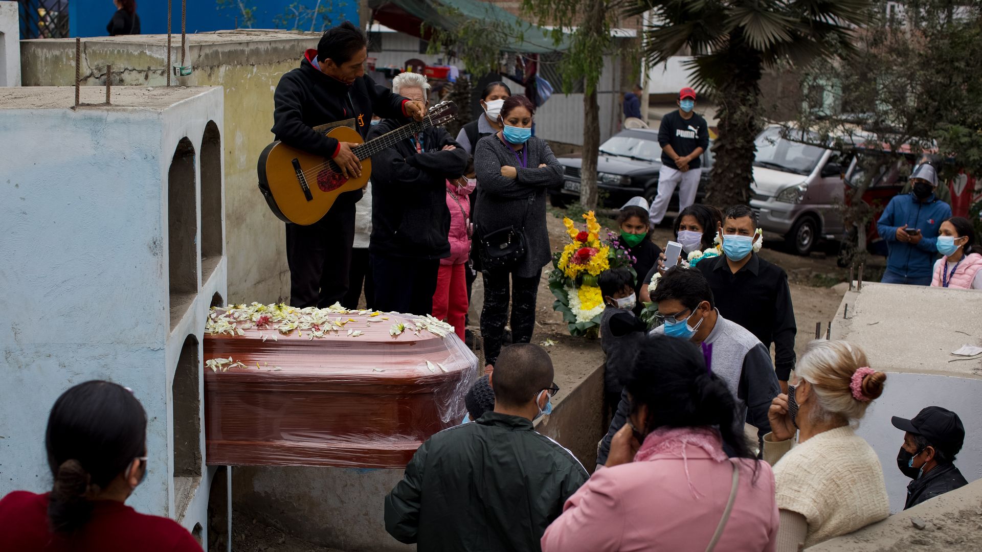 A funeral at a cemetery in Lima, Peru.