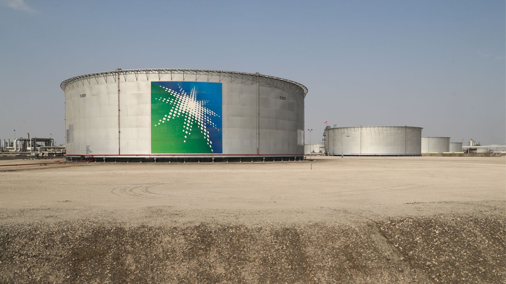Oil tanks at an oil processing facility of Saudi Aramco