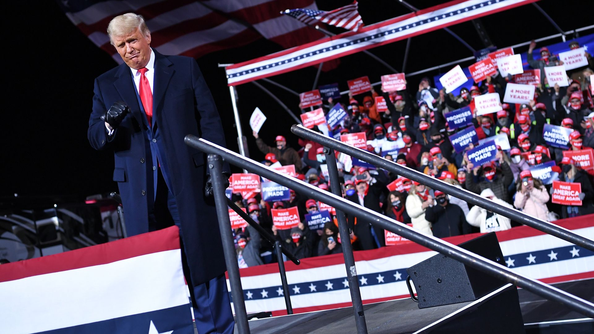 Trump walks off stage at a rally