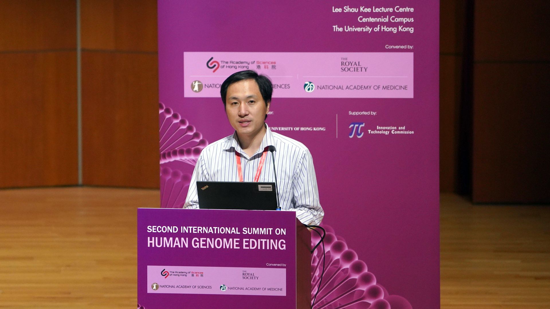 Photo of Chinese scientist He as he talks about his claim of editing embryos of twin girls