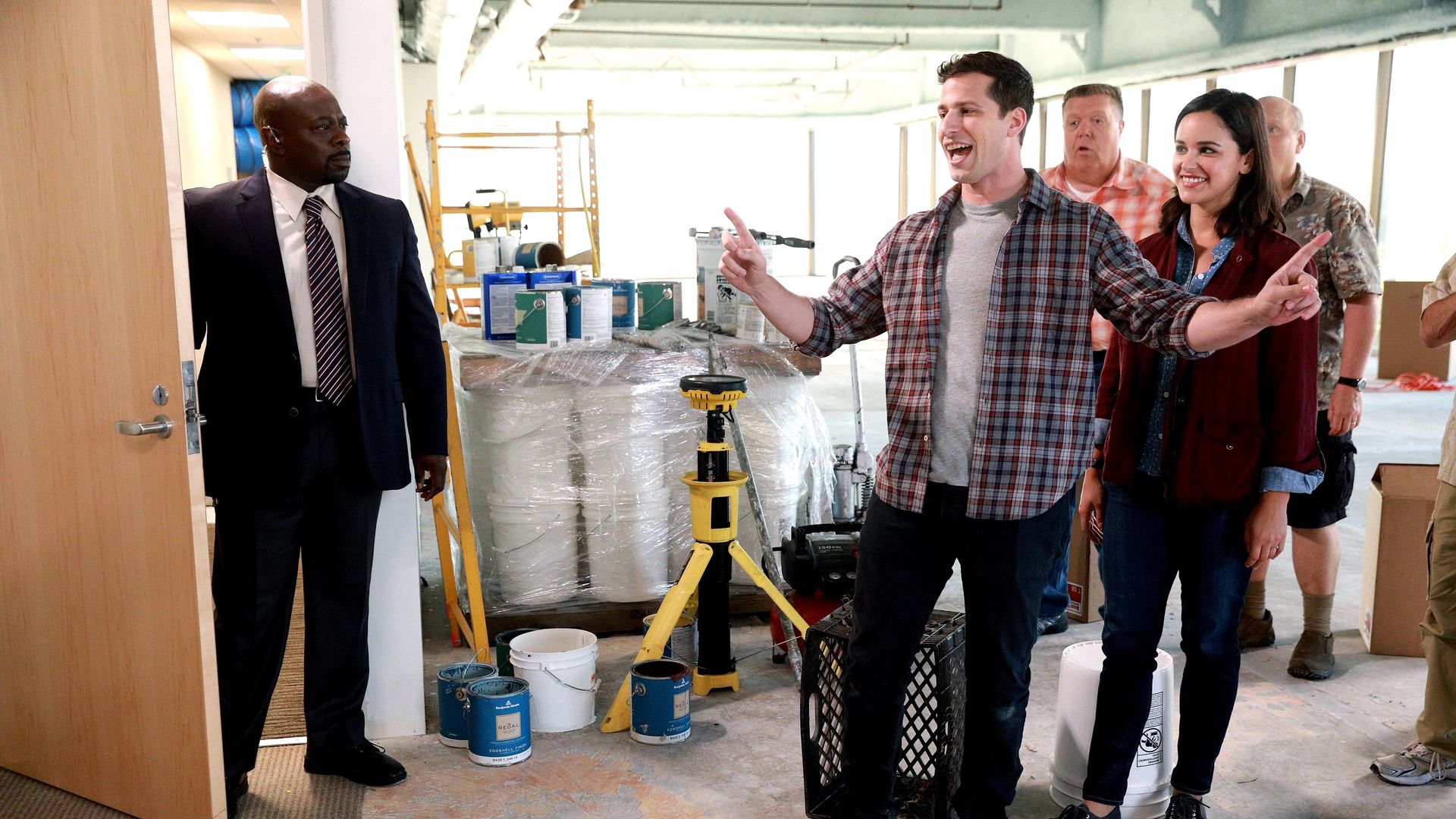 Andy Samberg gestures as he speaks