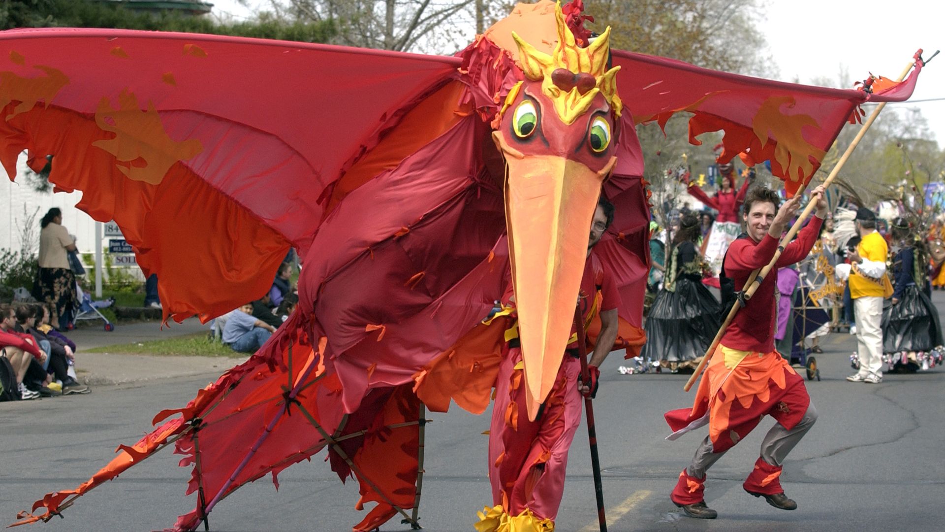 A photo of a large puppet that looks like a bird.