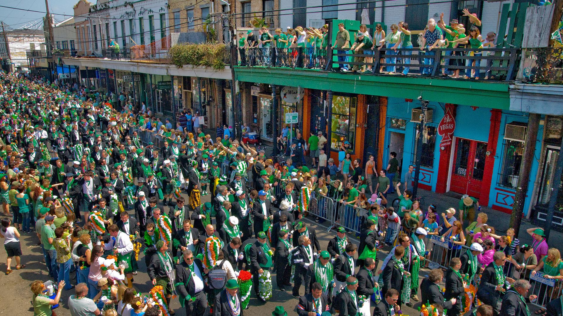 Photo shows a crowd on the street for St. Patrick's Day.