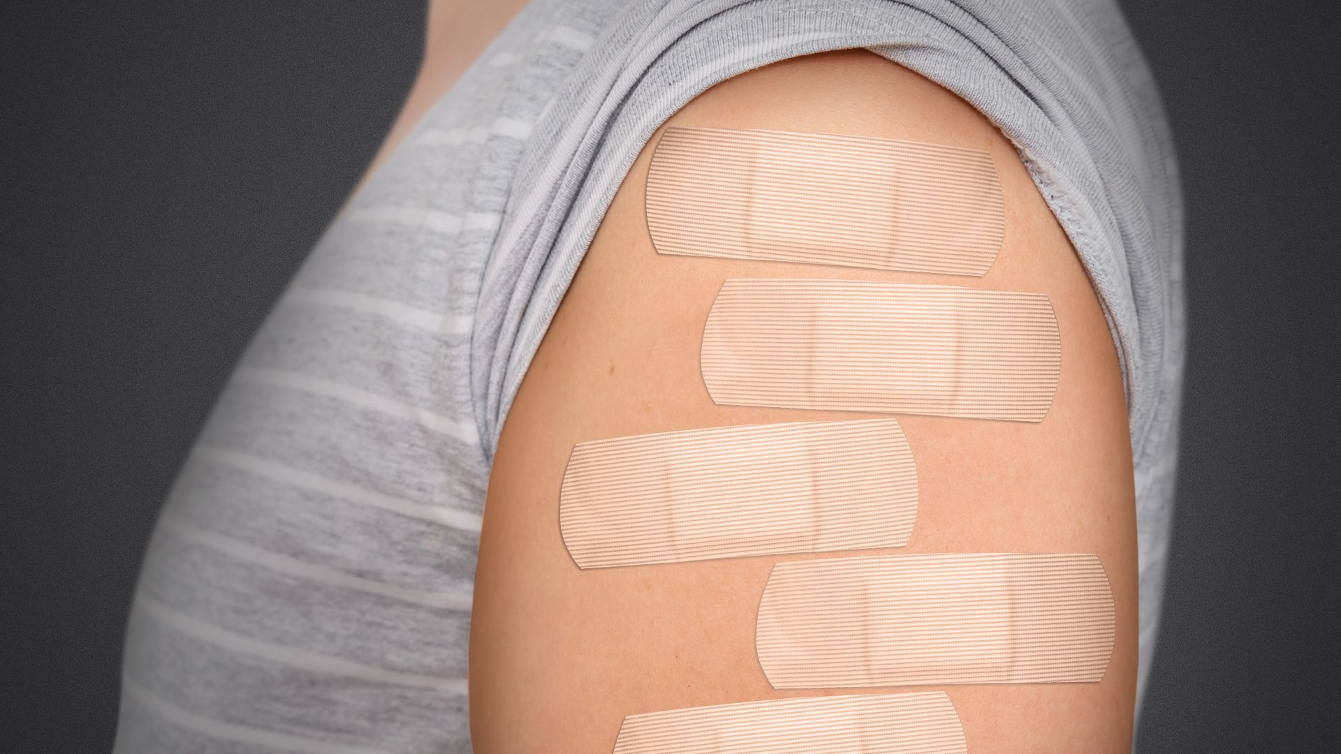 Illustration of a person's arm with multiple bandaids on it.