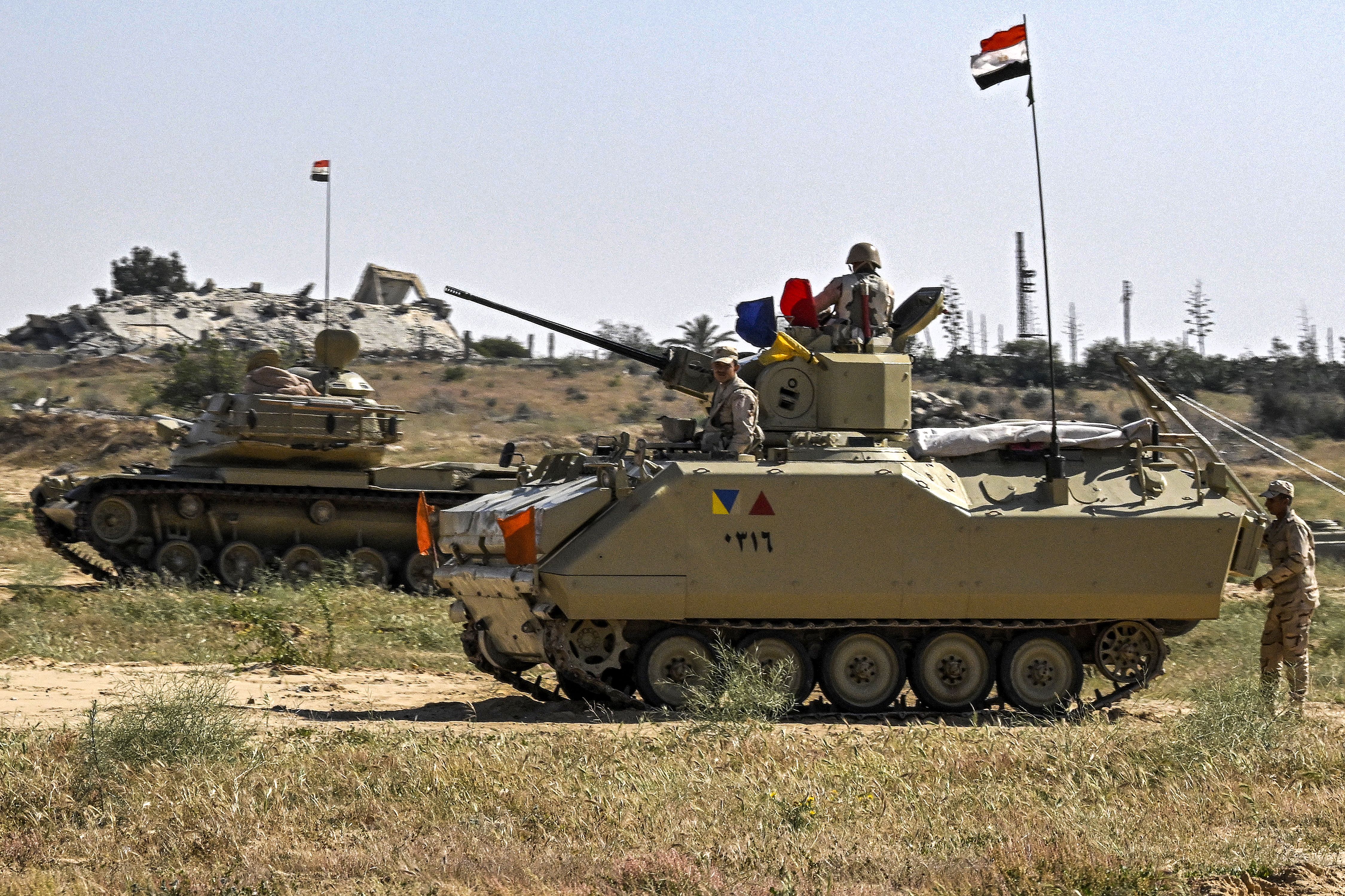 Egyptian military vehicles and personnel