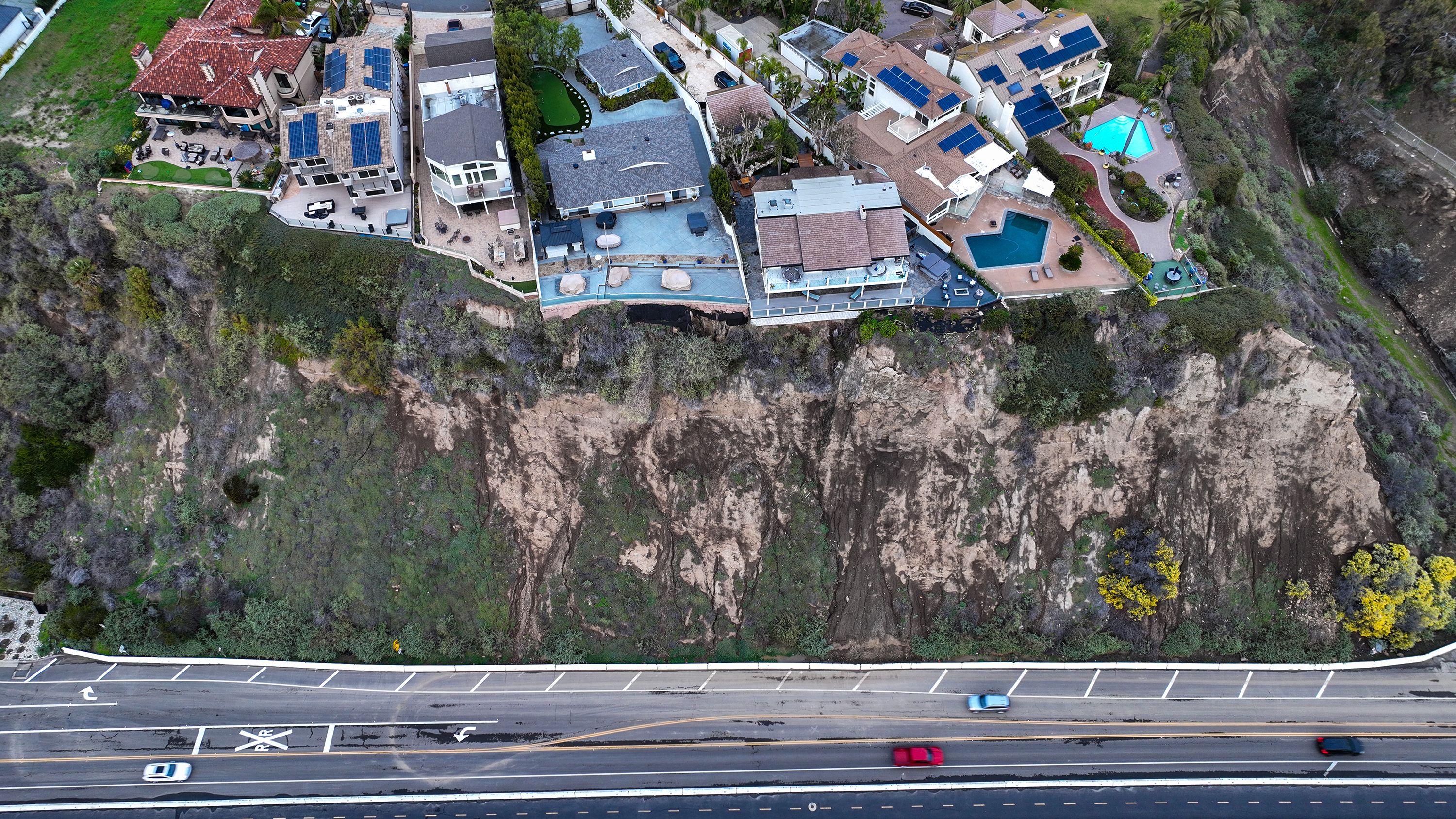  Unstable cliffs loom over Pacific Coast Highway as heavy rains threaten to create road-closing landslides on Jan. 4.