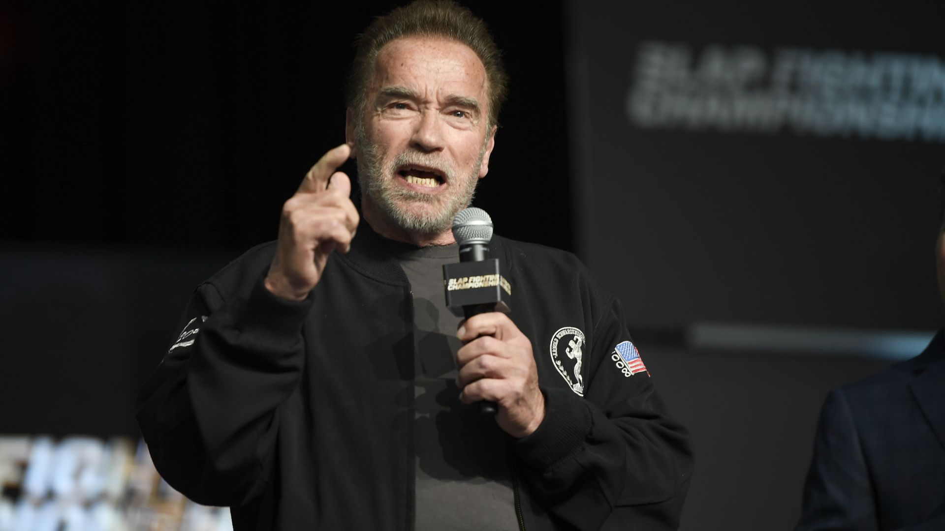 Arnold Schwarzenegger speaks on stage during the Arnold Sports Festival.