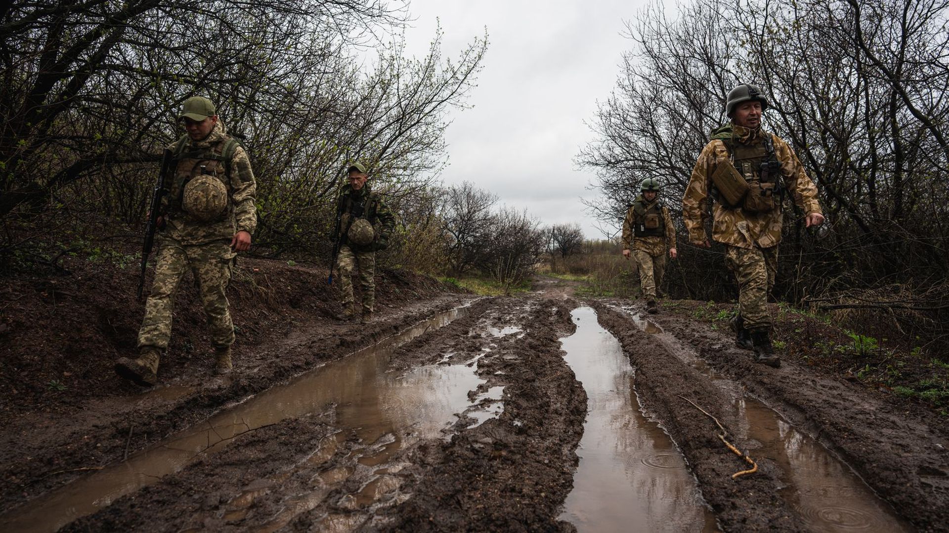 Ukrainian soldiers walk near the front line in the Donbas region of eastern Ukraine on April 14. Photo: Wolfgang Schwan/Anadolu Agency via Getty Images