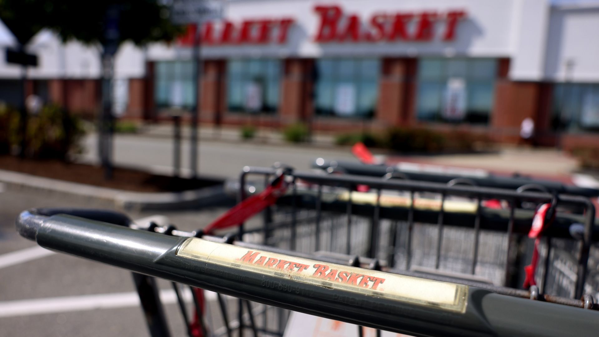 Shopping carts are seen outside of Market Basket.