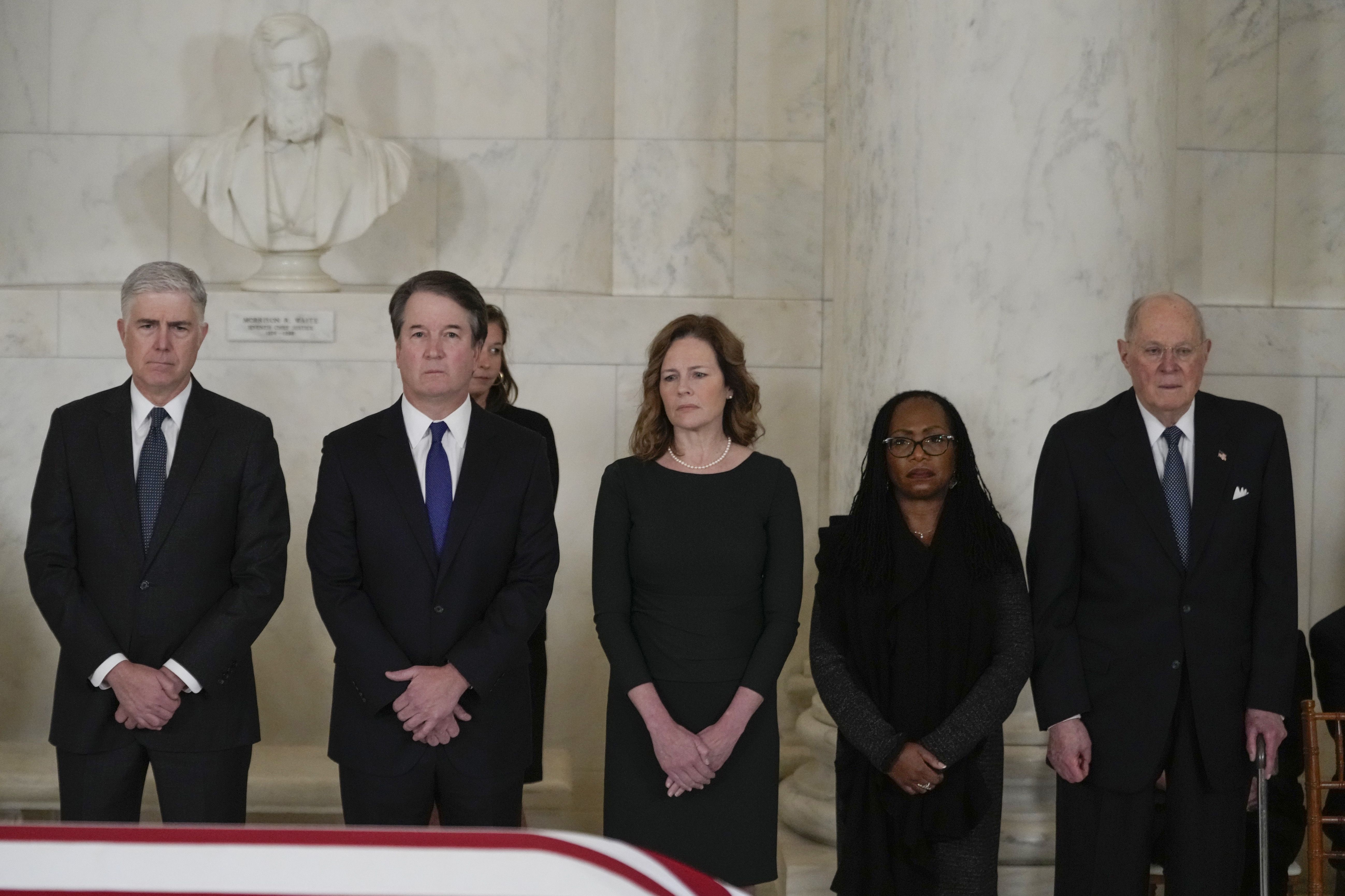 Five current / former SCOTUS justices stand