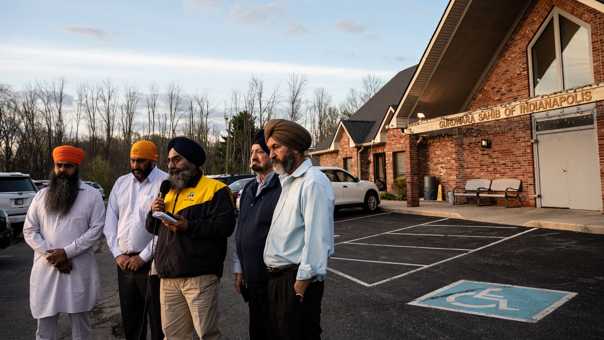  Leaders of the Sikh Satsang of Indianapolis participate in an interview addressing their grief in the parking lot of their temple on April 16, 2021 in Indianapolis, Indiana.