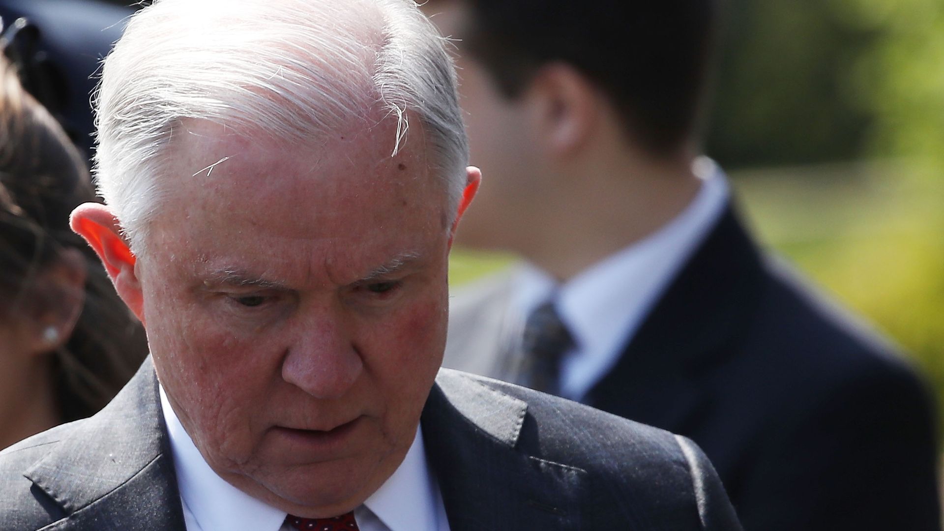 Jeff Sessions looking down seemingly deep in thought