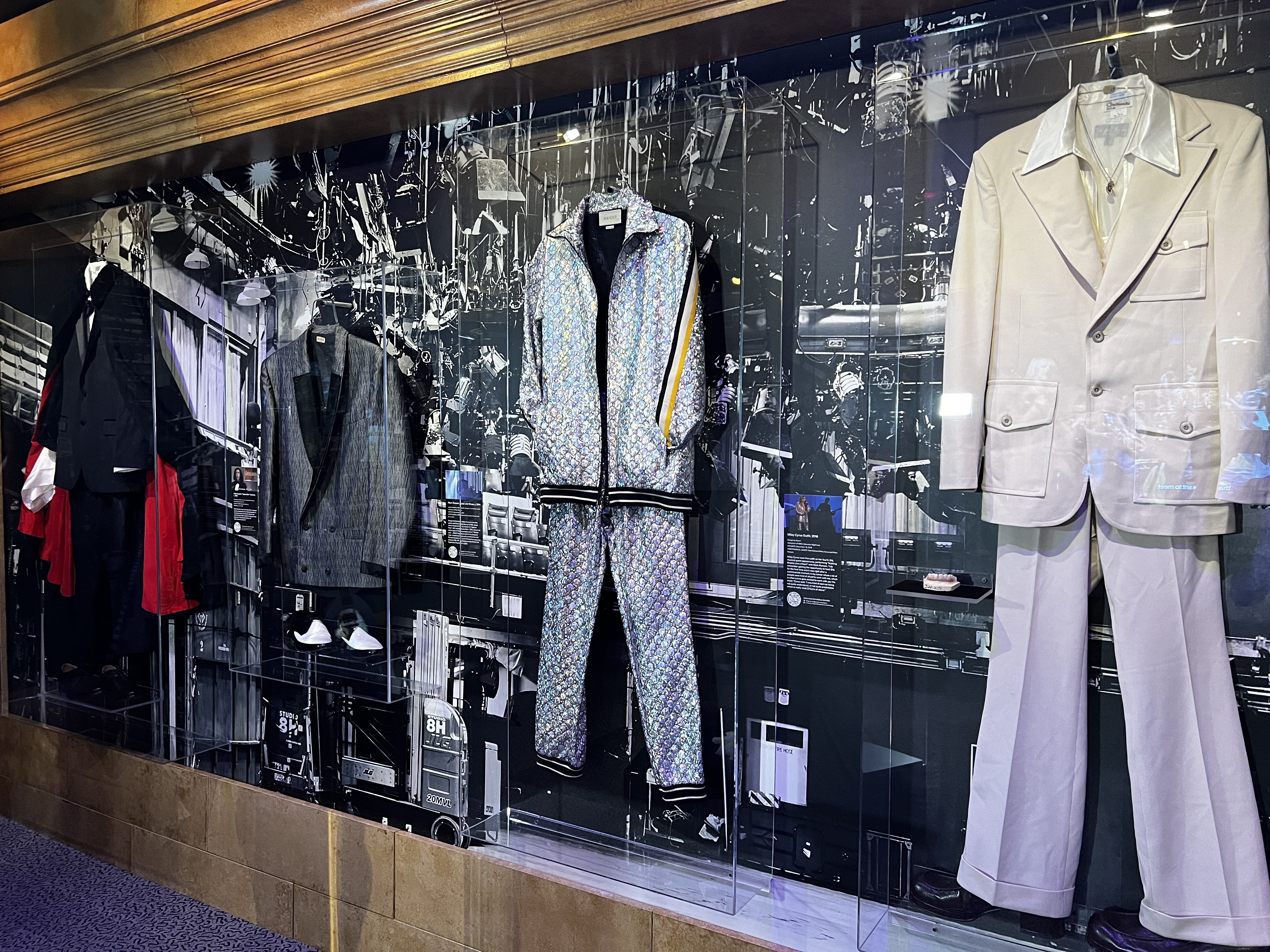 Outfits on a wall in the Rock Hall. 