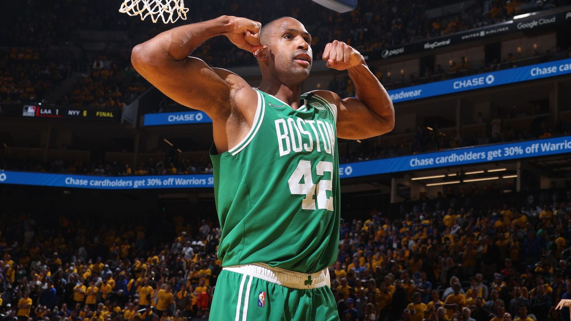 Boston's Al Horford flexes his muscles.
