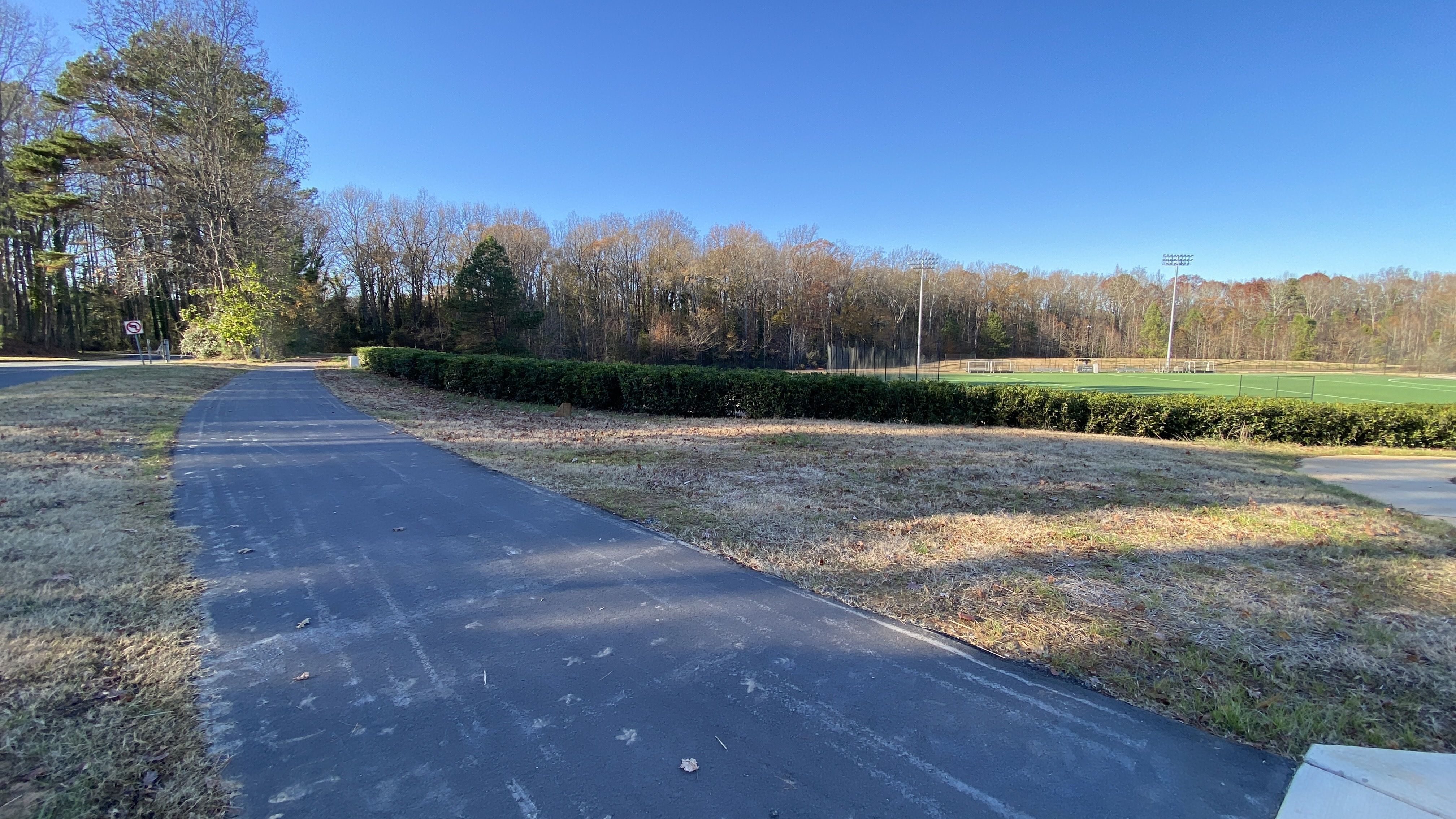 Little Hope Creek Greenway facing an athletic field.