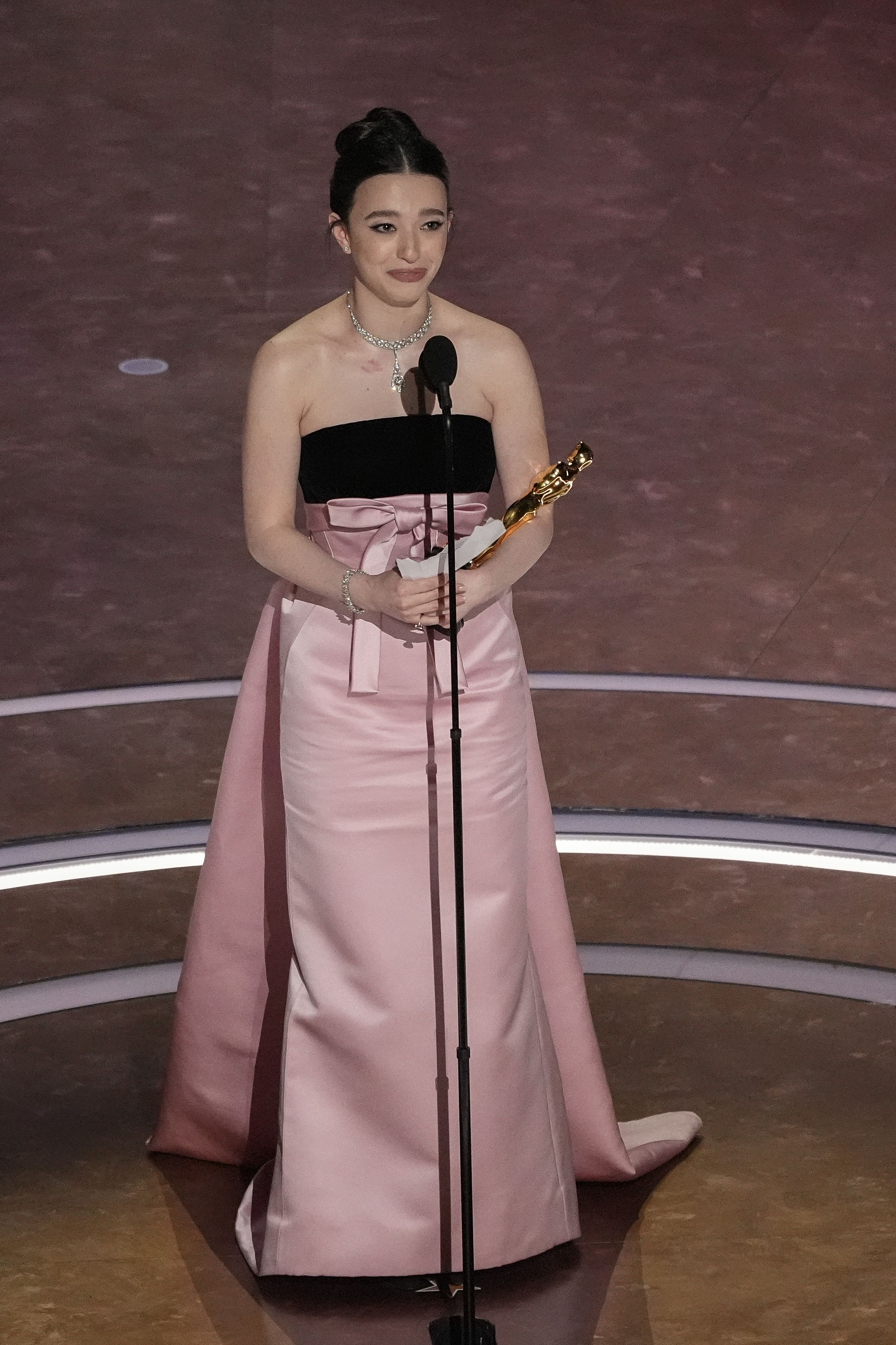 Mikey Madison accepts the award for best performance by an actress in a leading role for "Anora" during the Oscars on Sunday, March 2, 2025, at the Dolby Theatre in Los Angeles. (AP Photo/Chris Pizzello)