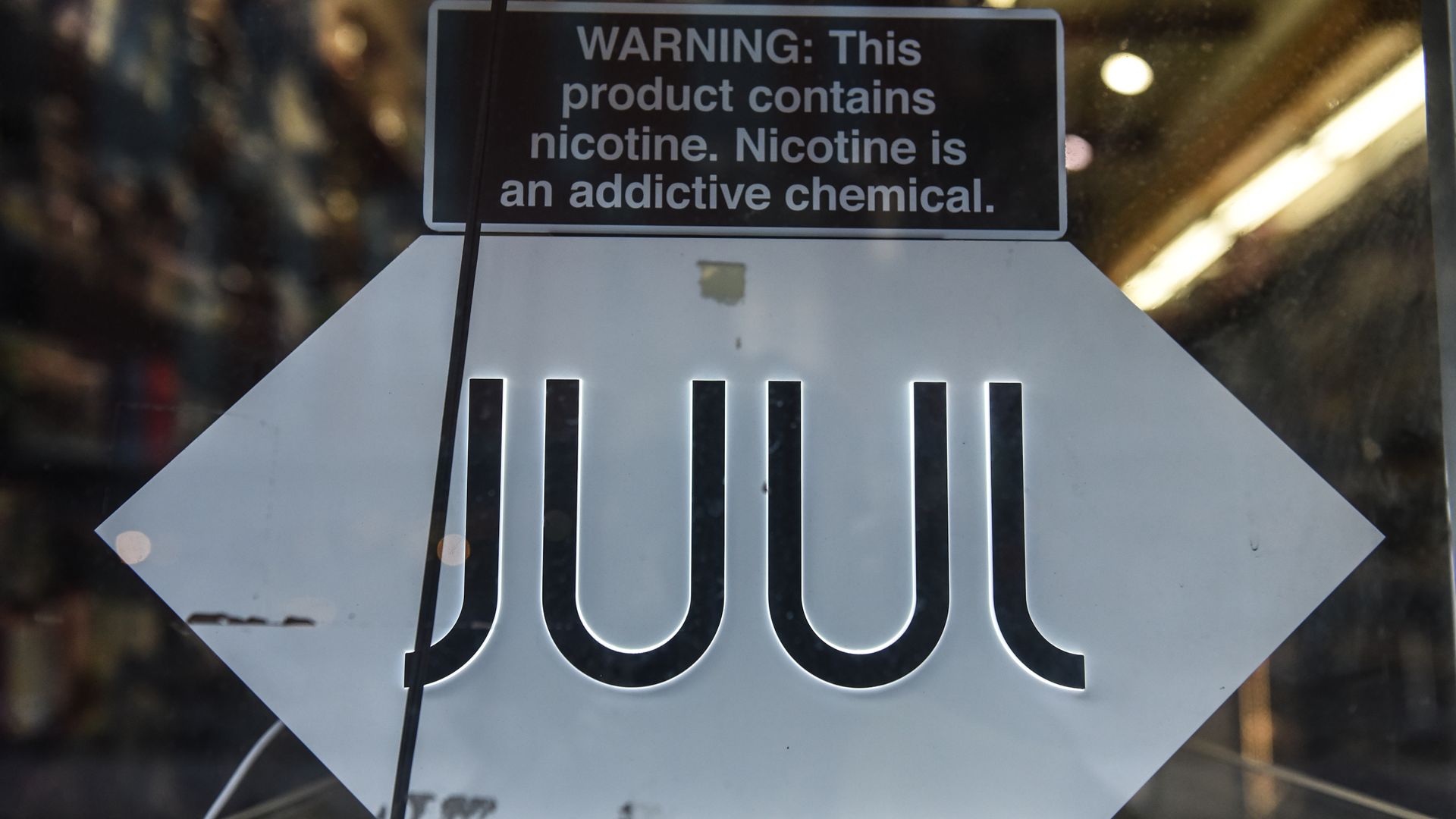 A sign advertising JUUL products is displayed in a store on December 19, 2019 in New York City. 