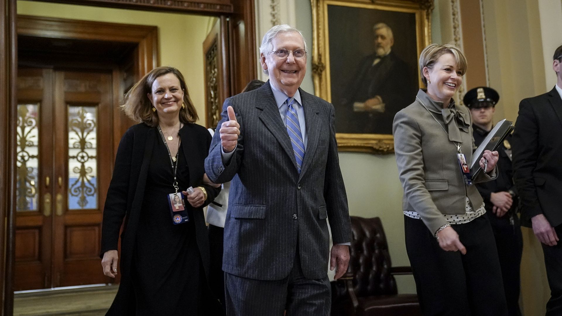 Mitch McConnell gives a thumbs up. 