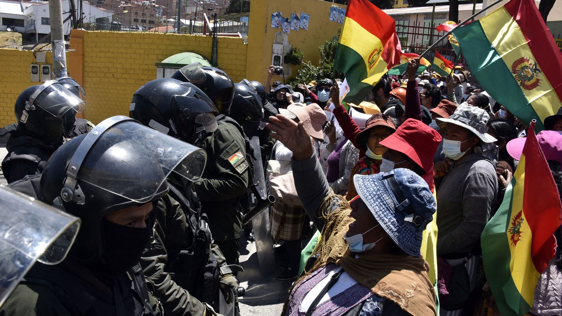 Women coca leaf producers confront with Bolivian riot police. 