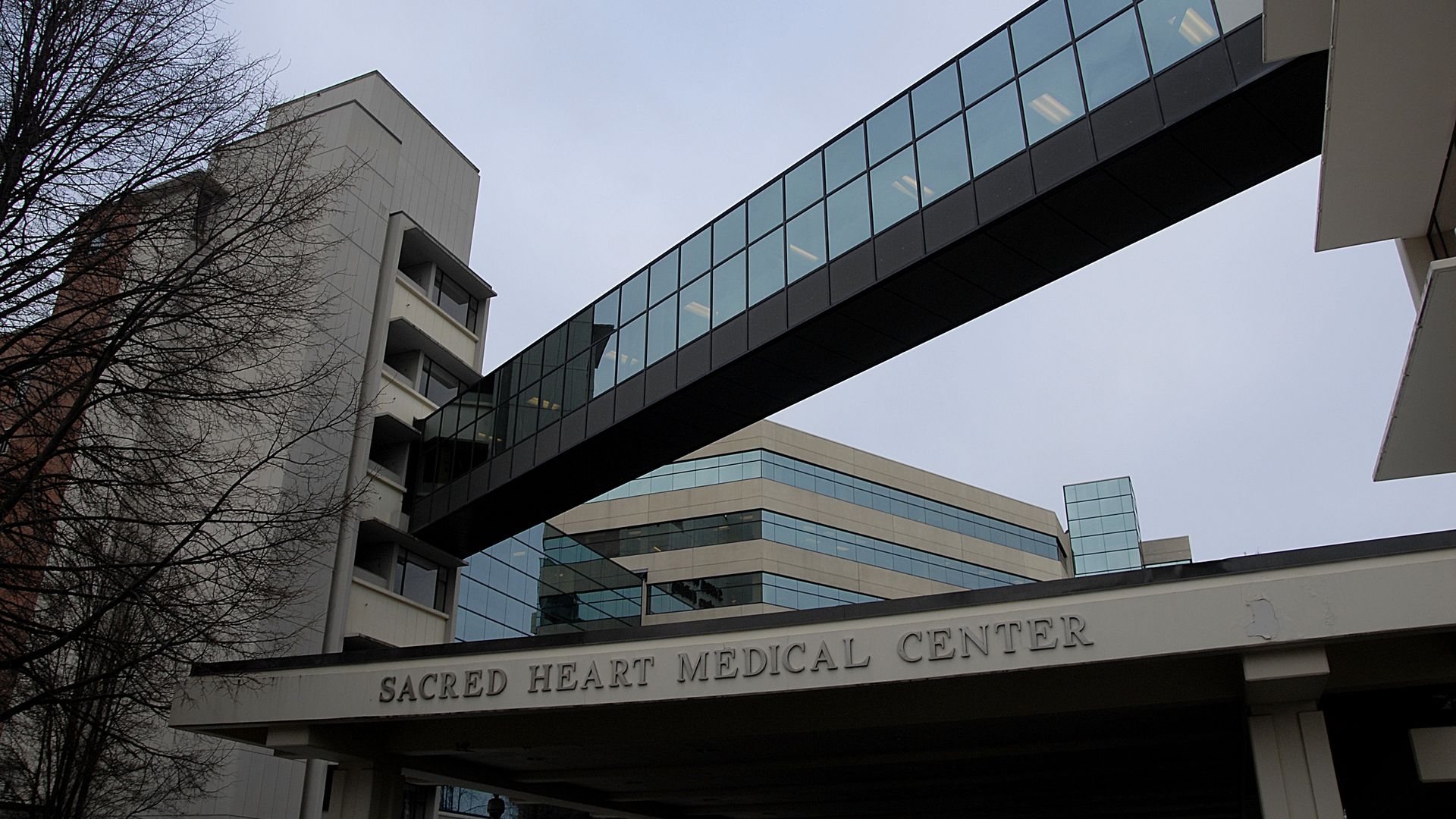 Providence Sacred Heart Medical Center building showing a connecting patient tunnel.