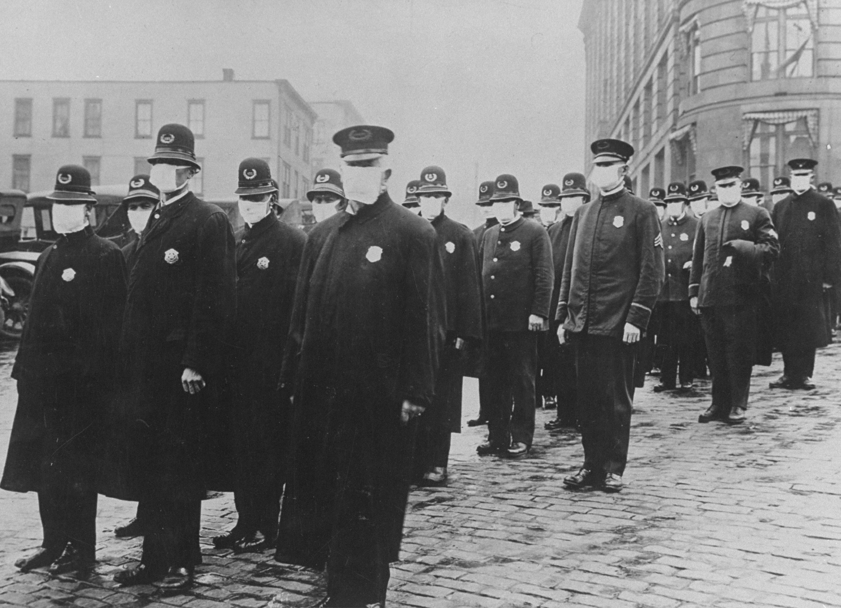Police officers wearing masks
