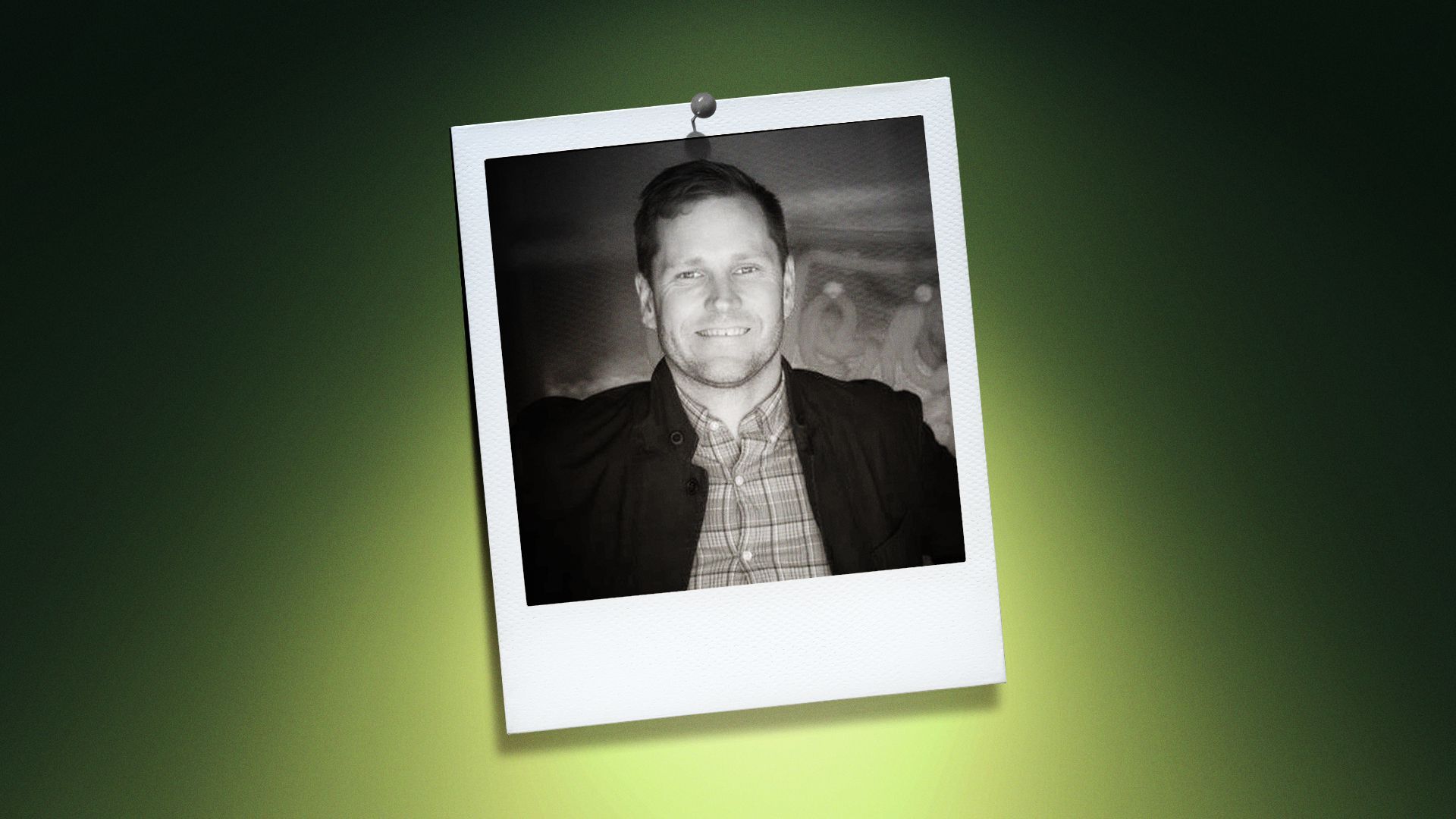 Photo illustration of David Meeker in the center of a Polaroid photo under a green spotlight.