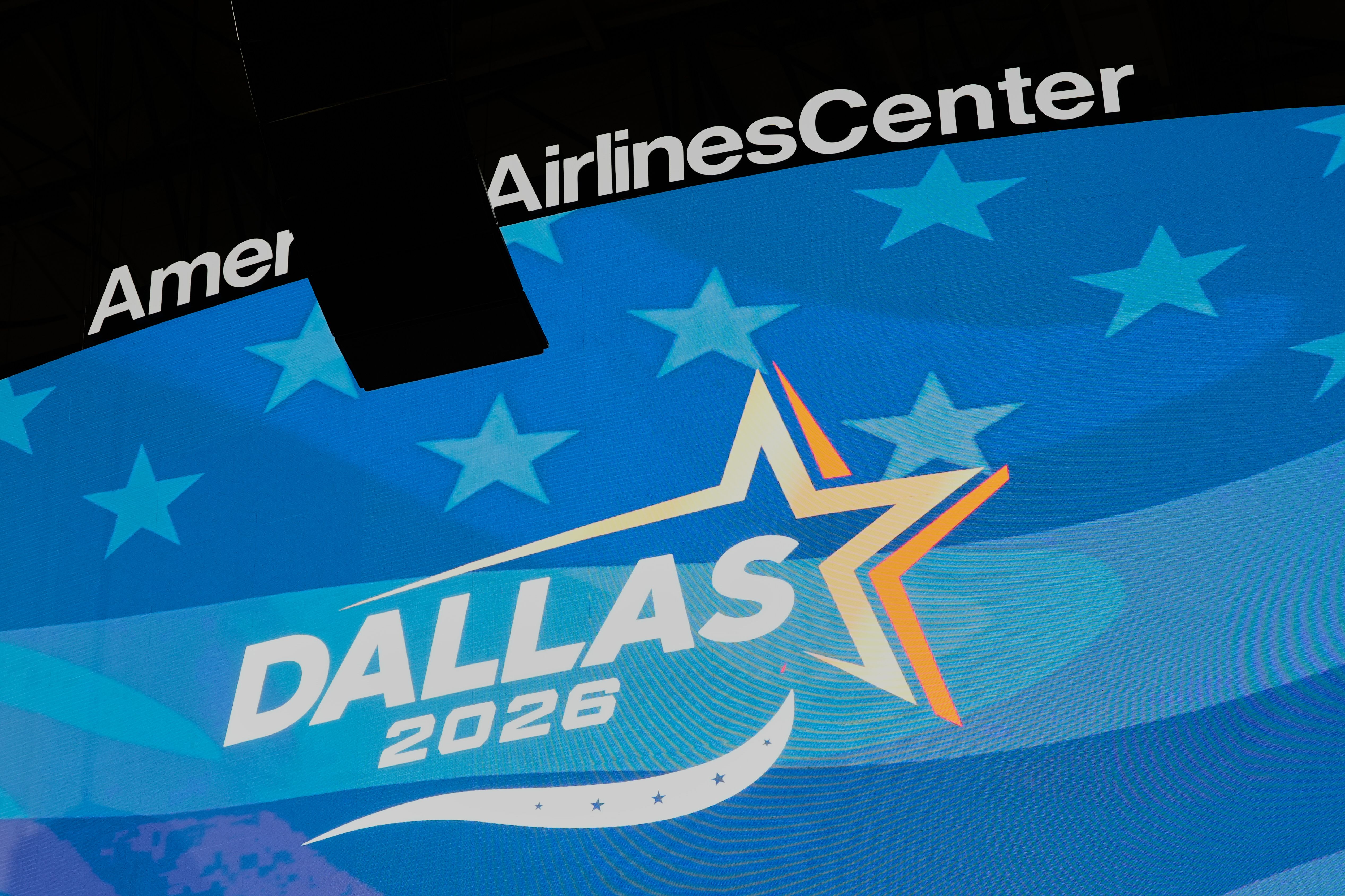 A large video board is shown inside American Airlines Center during a media walkthrough in Dallas, Wednesday, Aug. 5, 2026, ahead of the upcoming Republican National Convention. (AP Photo/Tony Gutierrez)