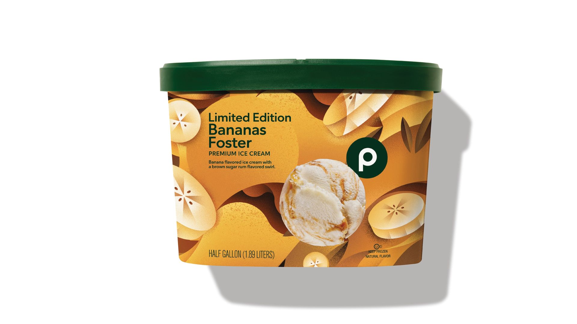 A frozen dessert pint with a dark green lid and a banana-patterned orange label reading "Limited Edition Bananas Foster Premium Ice Cream" on a white background.