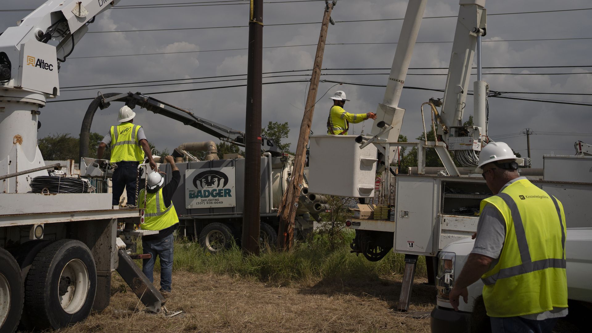 Line workers work to restore power in Houston after Hurricane Beryl